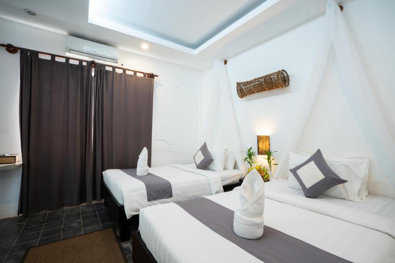 Ashia Hotel & Lounge Siem Reap Bagian luar foto